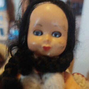 Vintage Hard Plastic Sleepy Eyed Doll with Knitted Handmade Dress